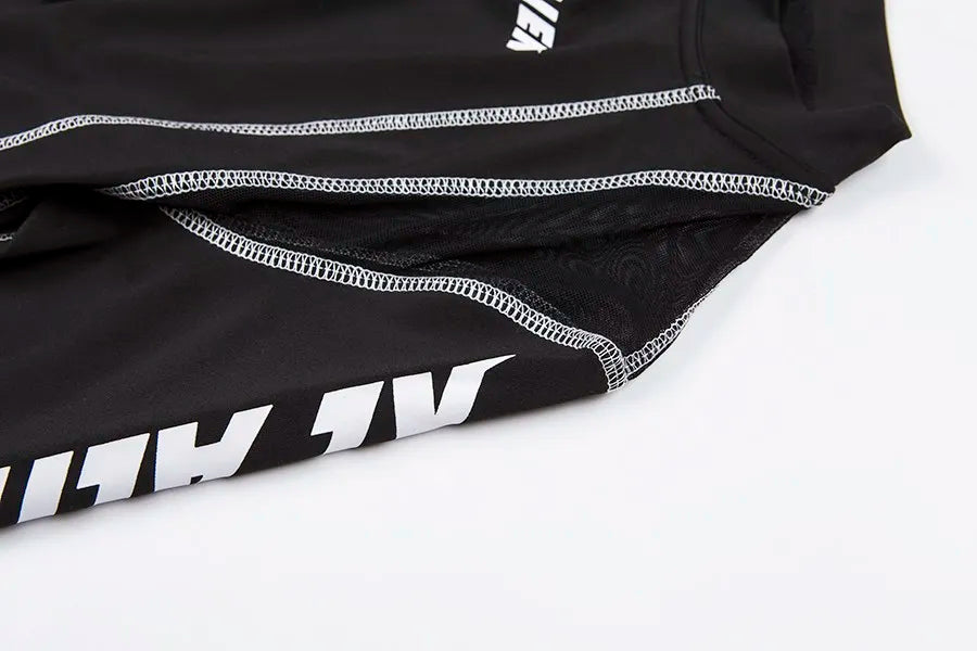 Conjunto deportivo de 2 piezas con estampado de letras para mujer, top corto de manga larga, leggings elásticos, ropa deportiva informal y ajustada