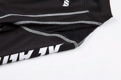 Conjunto deportivo de 2 piezas con estampado de letras para mujer, top corto de manga larga, leggings elásticos, ropa deportiva informal y ajustada